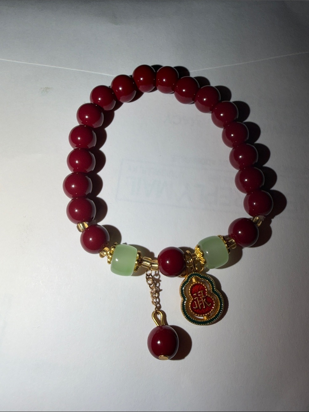 Red Beaded Charm Bracelet with Green Accent Beads